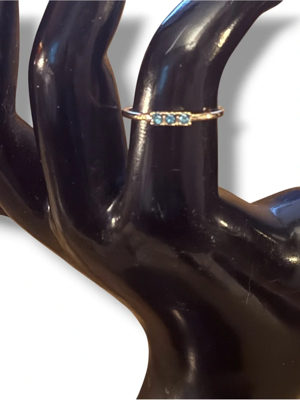 Dainty gold tone triple bezel set aquamarine ring